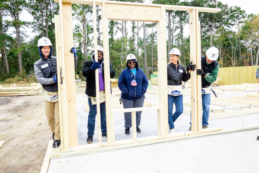 habitat for humanity volunteers building a home